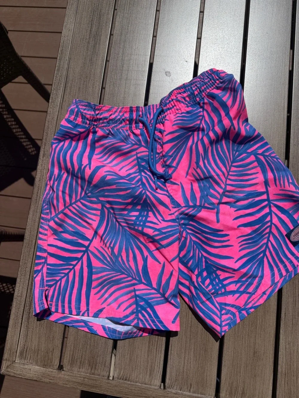 Vineyard Vines Pink and Blue Palm-Print chappy swim trunks. - Picture 1 of 6